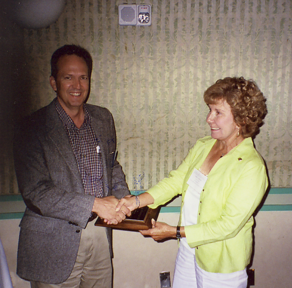 Anthony Weiss receives 2006 FES Annual Achievement Award for Industry  from Geri Cashion