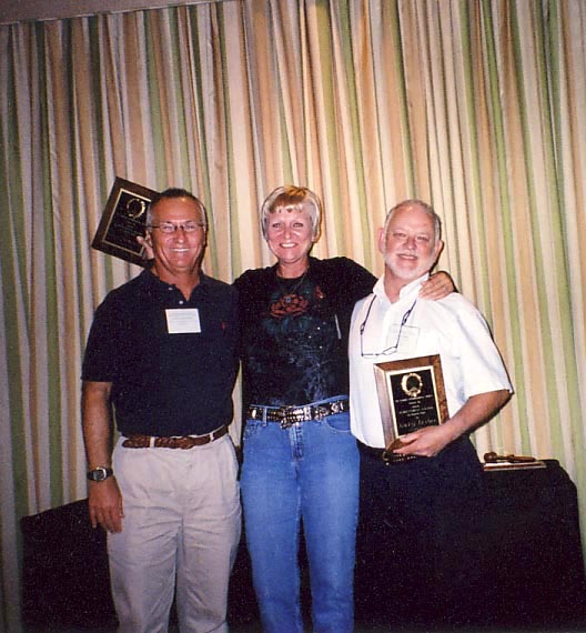 Cindy McKenzie and Gary Leibee receive 2009 Team Research Award from Scott Ferguson