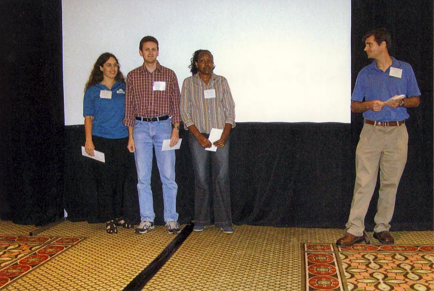 Elena Rhodes (3rd), Craig Roubos (2nd, Teresia Nyoike (1st) place awards in phd student competition
