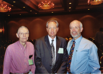Harold Denmark (left), David Hall (center), and Steve Lapointe in a discussion