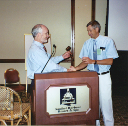 Steve Lapointe hands gavel over to incoming President, Rudi Scheffrahn