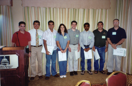 Student winners of FES 2005 $100 minigrants: (left to right) Ricky Vasquez, with Student Activities chair, Marco Toapanta, Amit Senthi, Karla Addesso, Joseph Smith, Murugesan Rangasamy,Rui Pereira, and James Dunford
